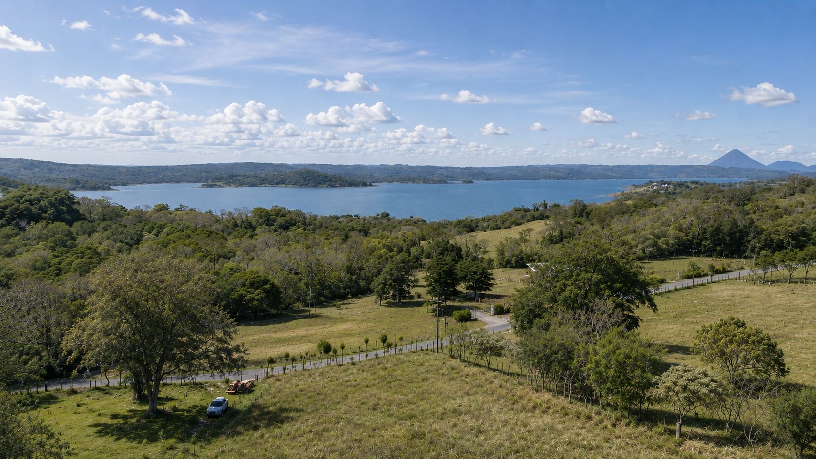 Aerial view of Lake Arenal with the volcano on the horizon