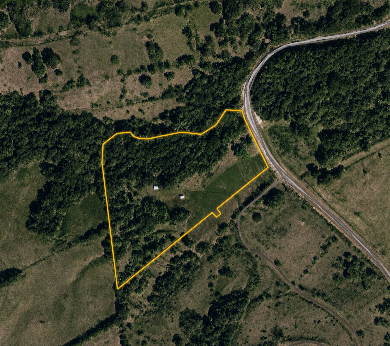 Satellite image showing the property's parcel boundary